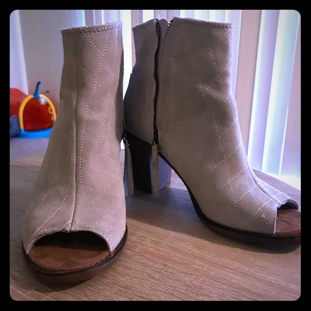 Selling these open toed heeled booties